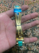 Gold Roman Dial Chronograph Watch with Turquoise Bracelet