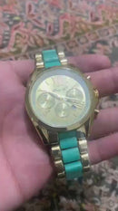 Gold Roman Dial Chronograph Watch with Turquoise Bracelet